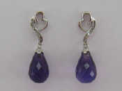 Appraisal: A pair of carat white gold diamond and amethyst earrings