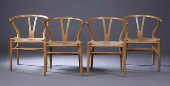 Appraisal: SET FOUR HANS WEGNER OAK ''WISHBONE'' CHAIRS Designed by Hans