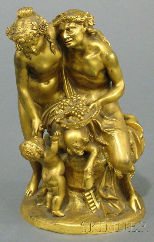 Appraisal: French Gilt-bronze Figural Group of a Satyr and Two Bacchantes