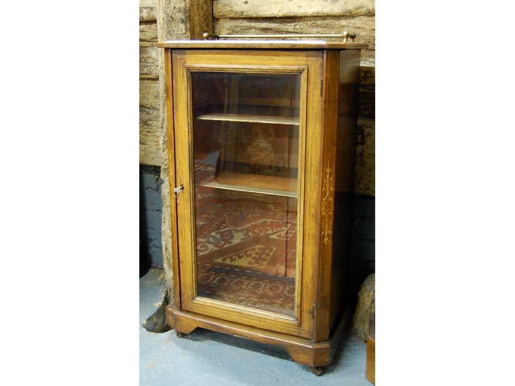 Appraisal: Victorian boxwood inlaid mahogany cabinet having a glazed door