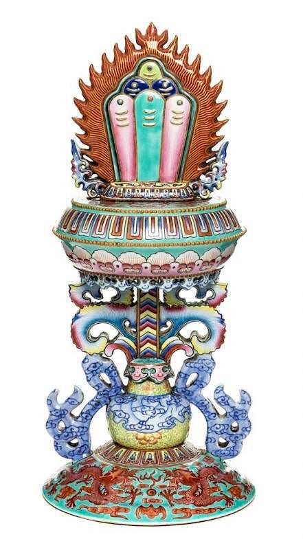 Appraisal: A Famille Rose Porcelain Buddhist Emblem Altar Ornament Height inches