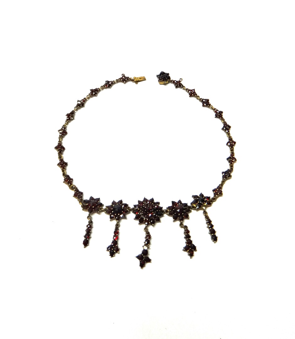 Appraisal: A Bohemian garnet set collar necklace the front designed as