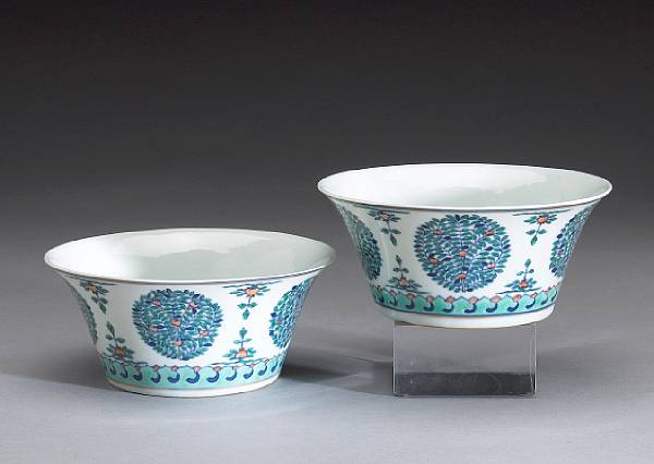 Appraisal: A pair of doucai-decorated porcelain bowls Jiaqing Marks Their tall