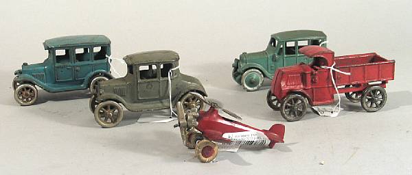 Appraisal: Cast iron transportation grouping Lot features land and air toys