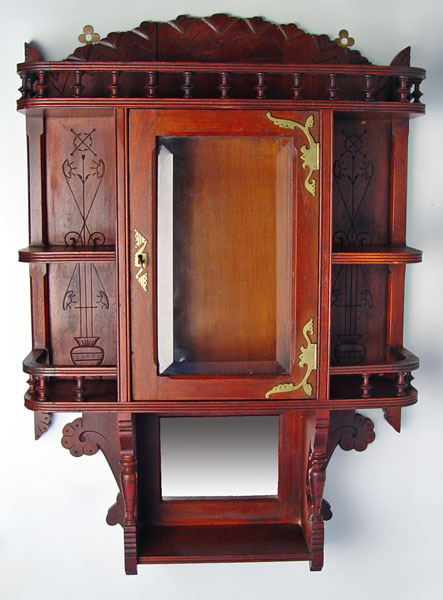 Appraisal: VICTORIAN CARVED MAHOGANY WALL MOUNT CABINET Carved with shelves and