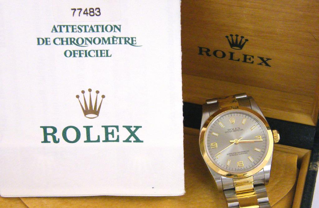 Appraisal: Rolex Oyster Perpetual stainless steel and k yellow gold mid-size