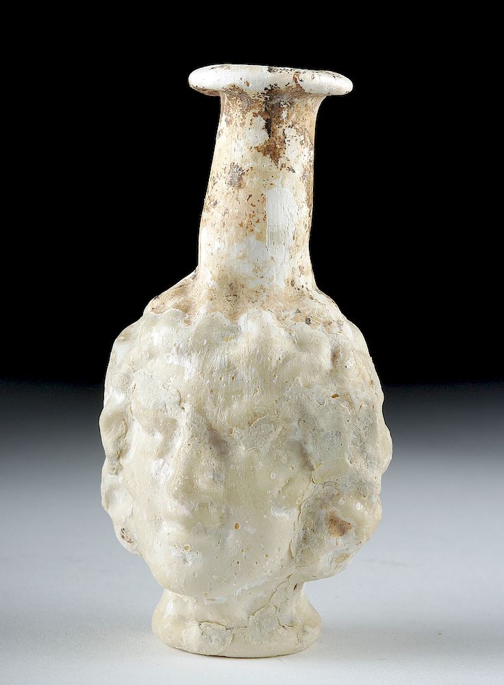 Appraisal: Roman Opaque White Glass Janiform Unguentarium Roman Sidonian Imperial Period