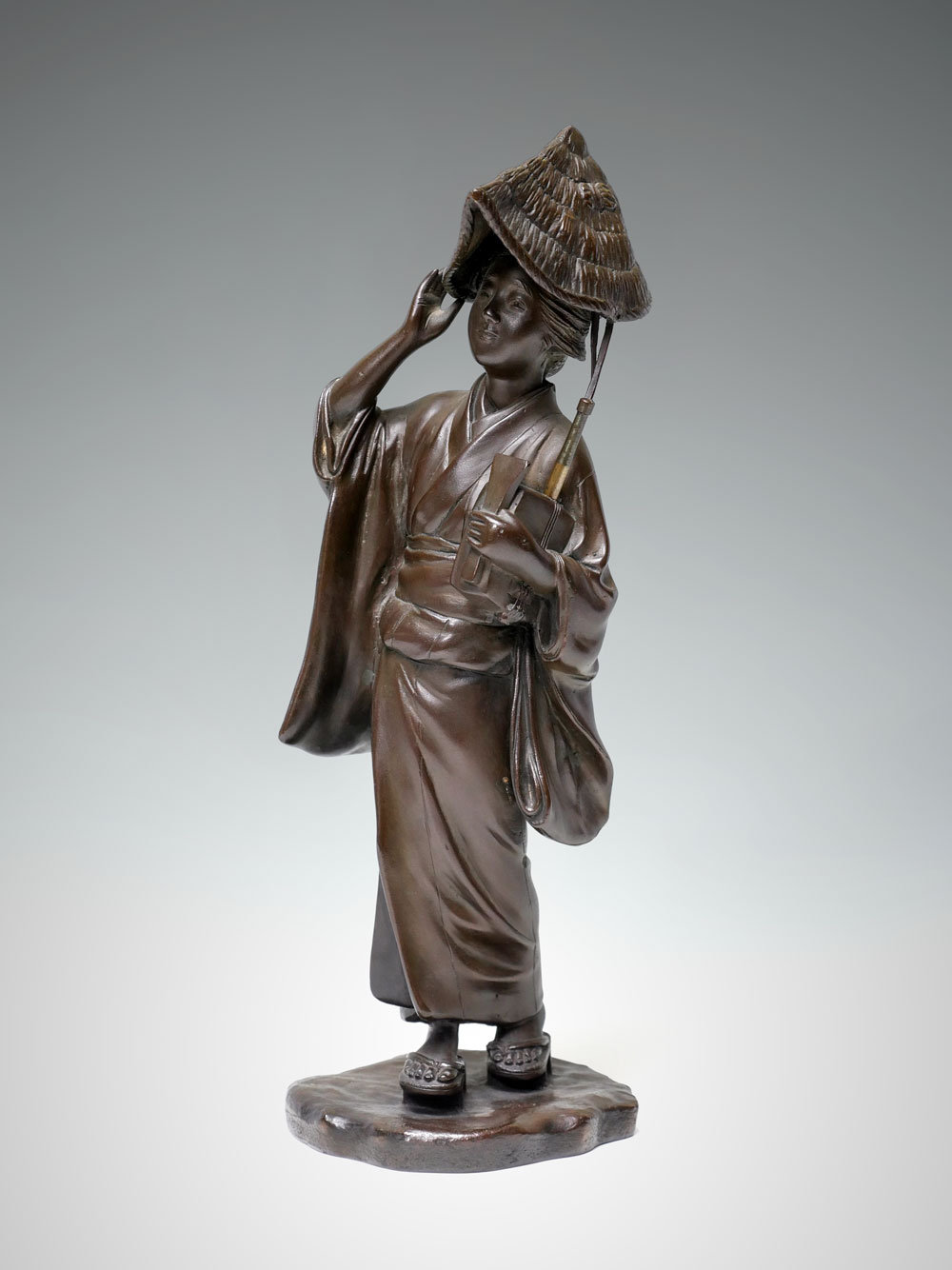 Appraisal: JAPANESE MUSICIAN BRONZE GIRL SCULPTURE Carries a Shamisen under her