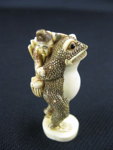 Appraisal: Carved Ivory Netsuke of Gamma Seninon a huge toad signed