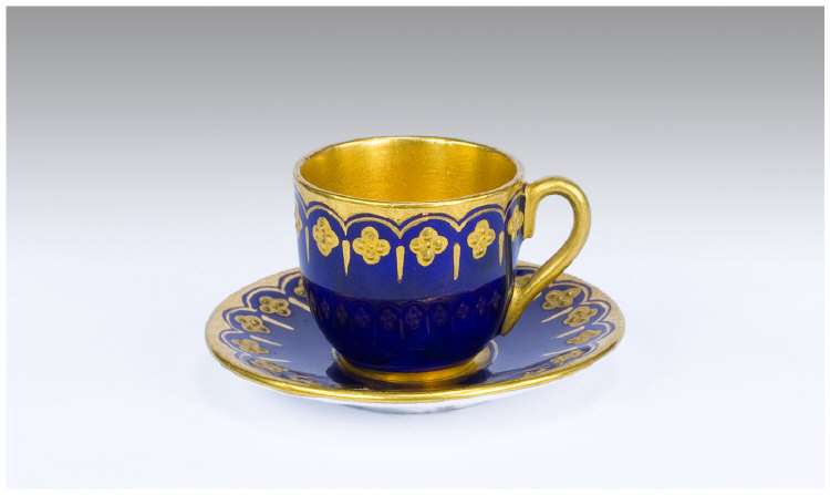 Appraisal: Late th Century Coalport Miniature Cup and Saucer Hand Painted