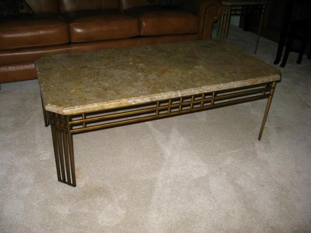 Appraisal: Marble Top Coffee Table in an Arts Crafts style with