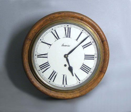 Appraisal: Oak gallery clock together with a wall clock dia h