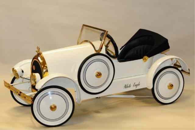 Appraisal: KISSEL ''WHITE EAGLE'' PEDAL CAR Creation in pressed steel styling