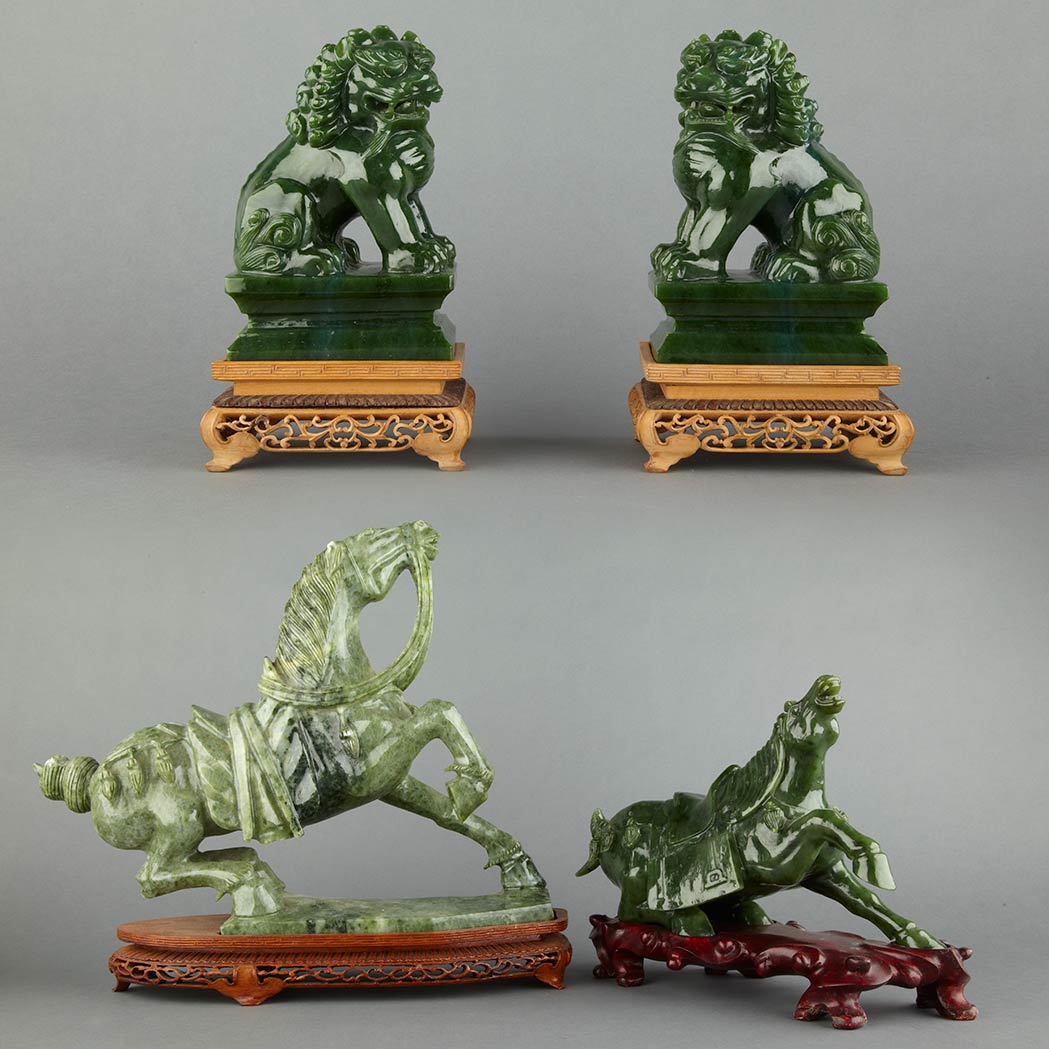 Appraisal: Pair of Chinese Spinach Jade Foo Lions Each seated beast