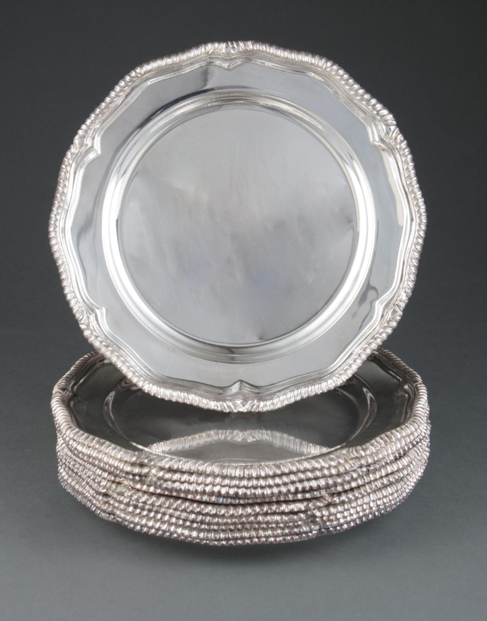 Appraisal: Ten Chippendale-Style Silverplate Chargers serpentine gadrooned borders marked ROYAL CASTLE