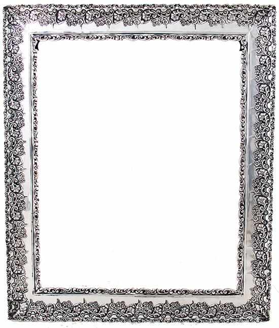 Appraisal: Ornate silver picture frame floral motif unmarked H '' W