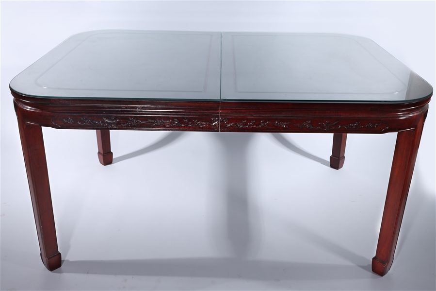 Appraisal: Chinese glass-topped wooden dining table cherry wood carved with ornate