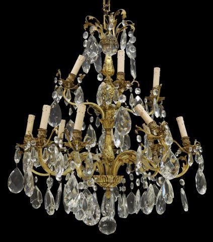 Appraisal: Italian gilt metal and crystal twelve-light chandelier th c undulating