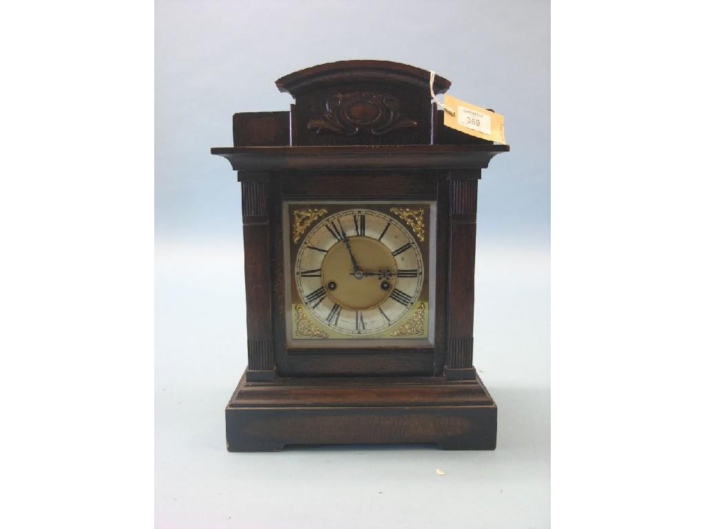 Appraisal: A th century dark oak mantel clock traditional square dial