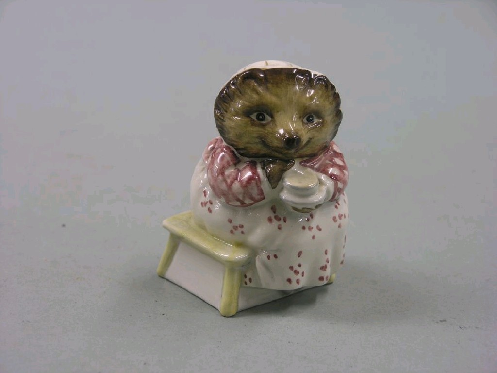 Appraisal: A Beswick Beatrix Potter character 'Mrs Tiggywinkle Takes Tea'