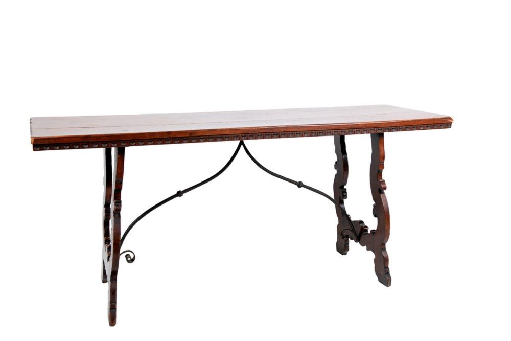 Appraisal: SPANISH WALNUT TRESTLE TABLEwith iron stretcher inches wide inches deep