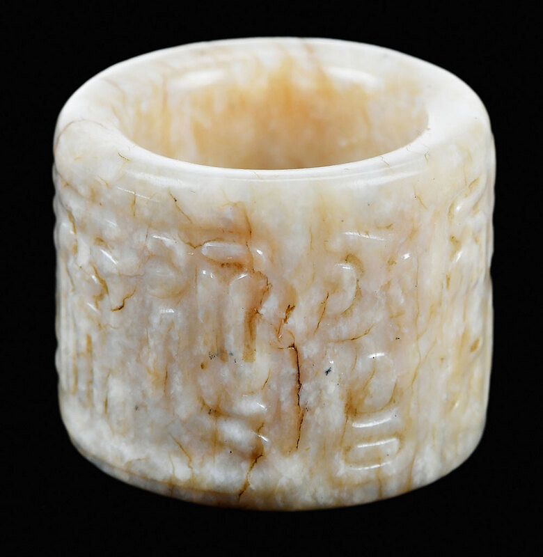 Appraisal: Chicken Bone Jade Carved Archer's Ring Chinese age unknown carved