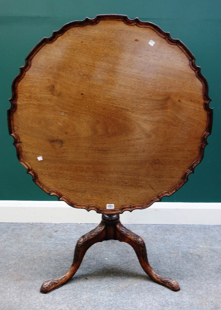 Appraisal: A George III mahogany occasional table the pie crust snap