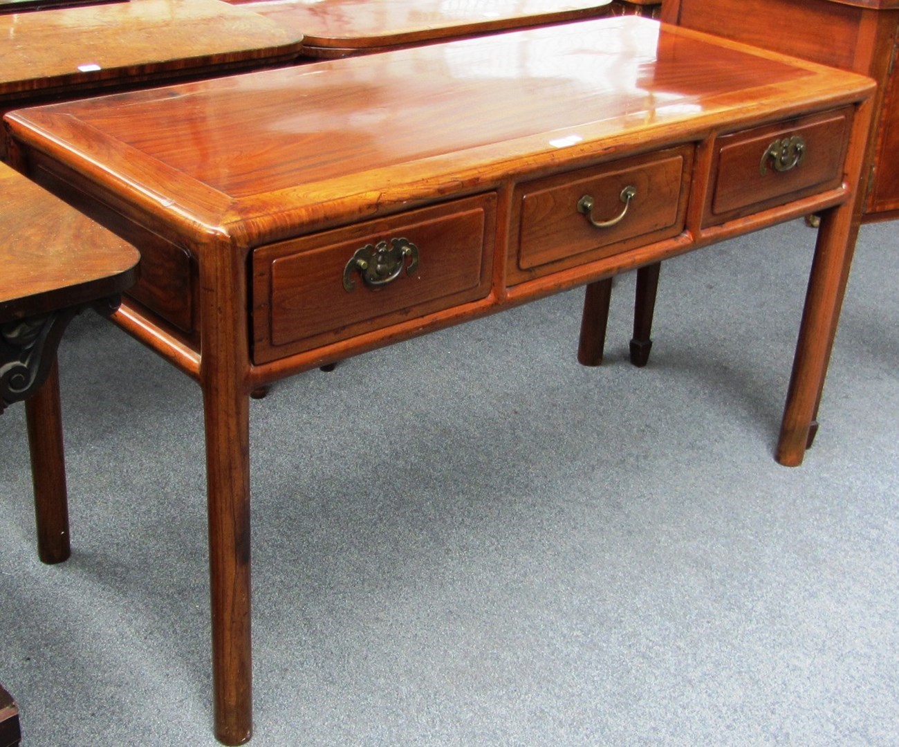 Appraisal: An early th century Chinese elm side table the rectangular