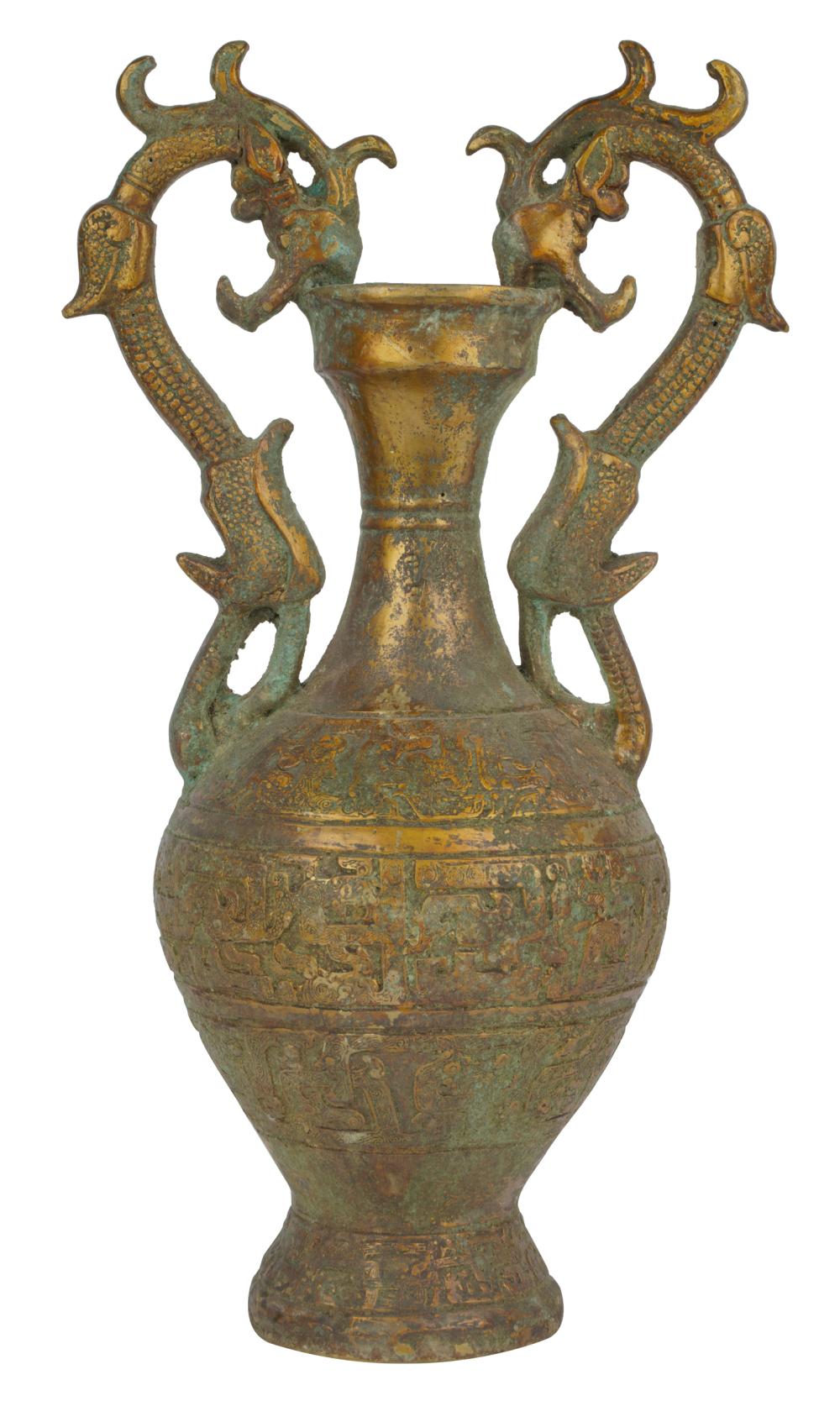 Appraisal: CHINESE BRONZE VESSELwith relief-cast decoration and dragon handles inches high