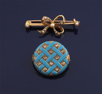 Appraisal: A gold circular brooch with blue enamel strap work decoration