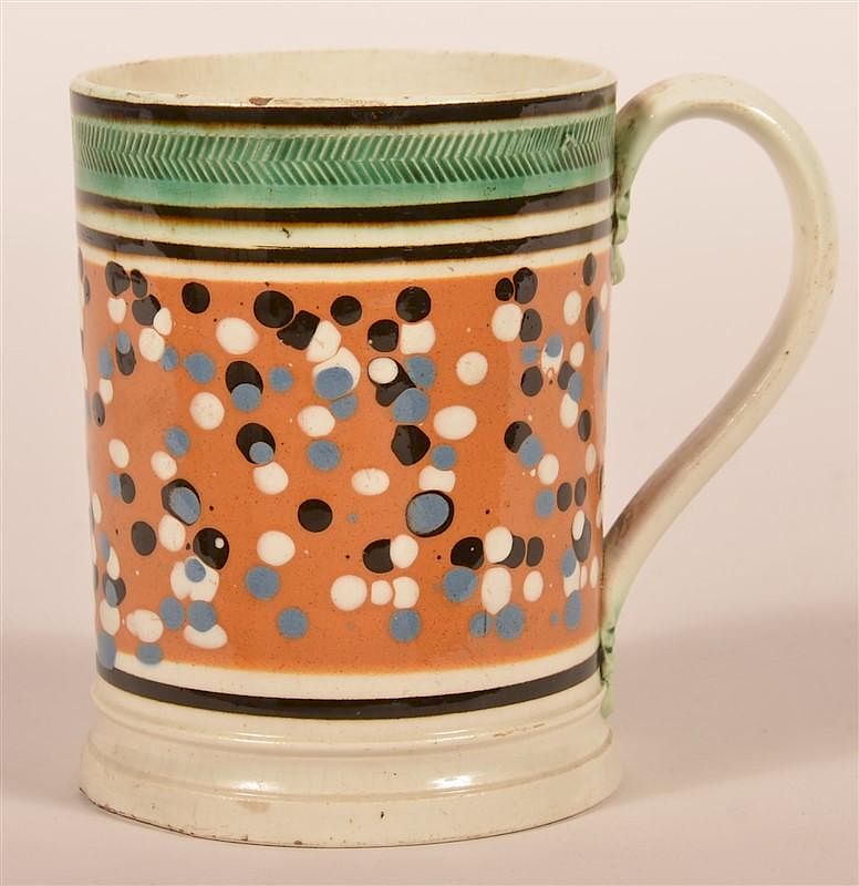 Appraisal: Mocha Drip Slip Decorated Soft Paste China Mug Mocha Drip