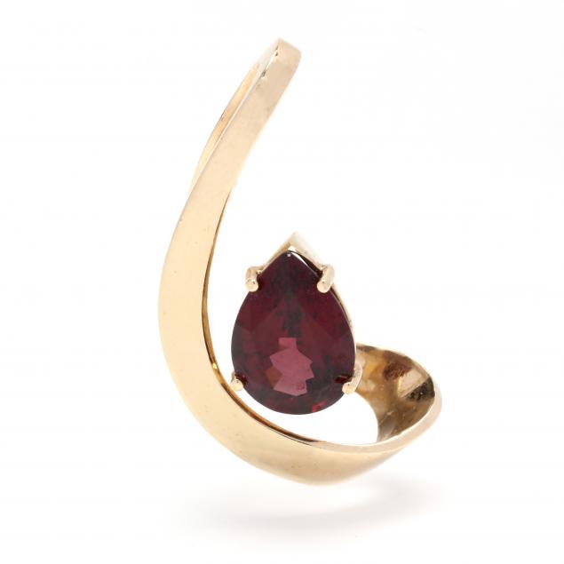 Appraisal: Gold and Garnet Slide Crescent design set with a pear