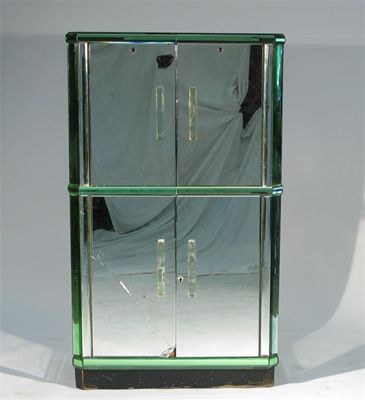 Appraisal: An Art Deco mirrored glass cocktail cabinet in the style