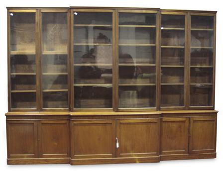 Appraisal: A late th century large mahogany breakfront bookcase the projected