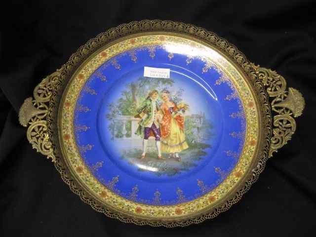 Appraisal: Czechoslovakian Porcelain Serving Dish courting scene elaborate openwork bronzed border