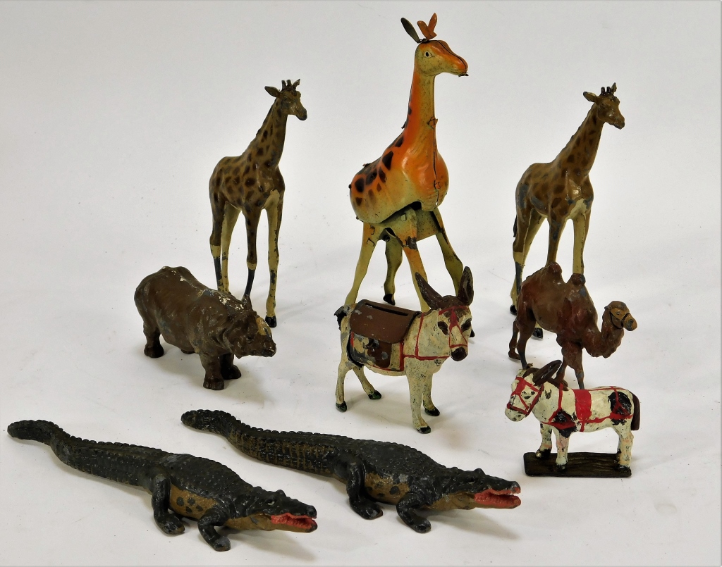 Appraisal: PC ASSORTED WILD ANIMAL CAST IRON AND TIN TOYS United