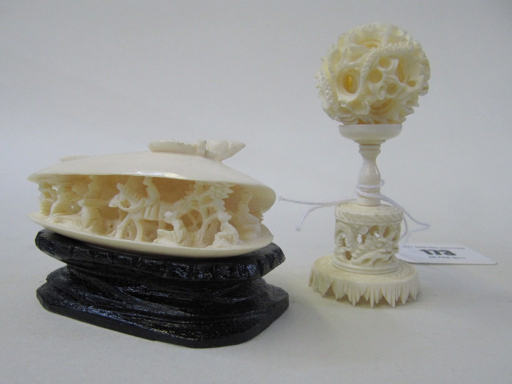 Appraisal: Lot comprising Japanese ivory puzzle ball and a carving