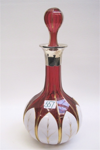 Appraisal: BOHEMIAN CRANBERRY GLASS DECANTER c overlay with white glass and