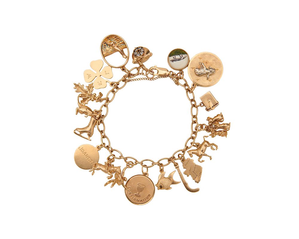 Appraisal: K Gold Charm Bracelet K Gold Charm Bracelet the oval-link