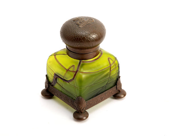 Appraisal: A green streaked glass inkwell Of circular form with hinged