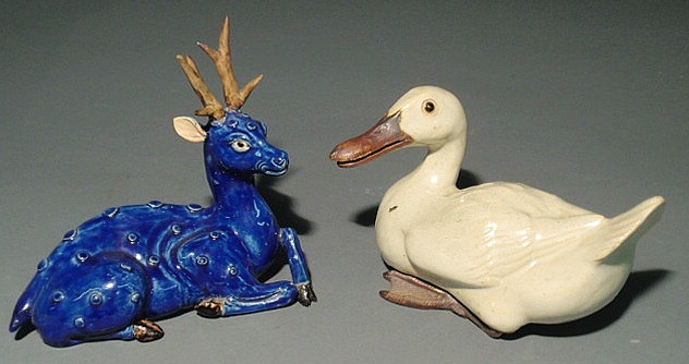 Appraisal: Two Chinese export earthenware figures late th c duck h