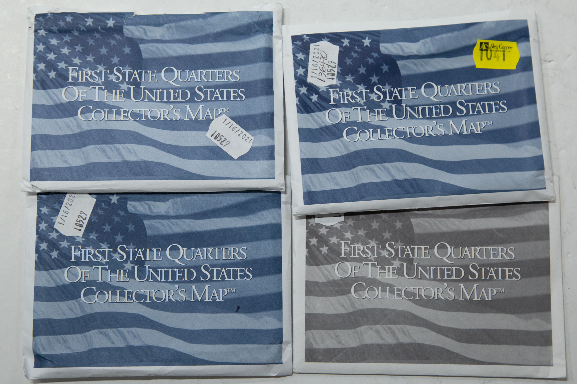 Appraisal: FOUR SETS OF STATE QUARTERS FOR COLLECTOR'S MAP Five -P