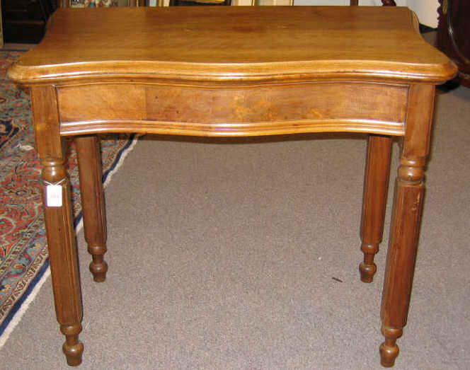 Appraisal: AMERICAN TH CENTURY WALNUT GAMES TABLE Shaped top hinged opens