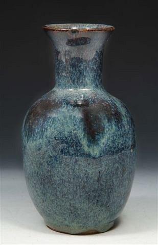 Appraisal: A CHINESE VASE with flared rim with guan-type green crackled