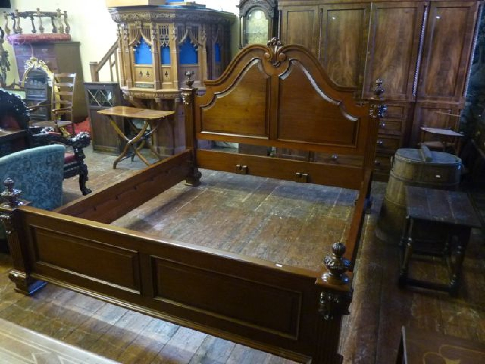 Appraisal: A Super King size mahogany bedstead with carved and panelled