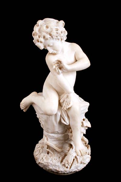 Appraisal: An Italian carved alabaster figure of a putti overall height