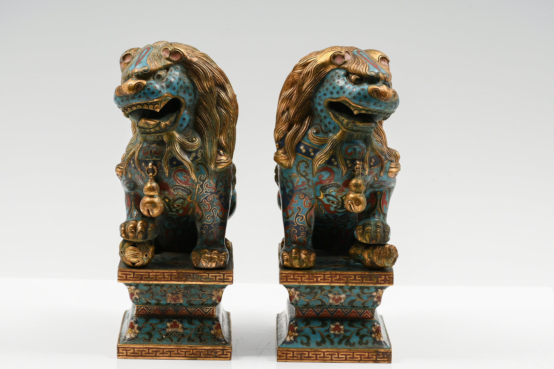 Appraisal: PAIR OF CHINESE GILT CLOISONNE FOO DOGS A set of