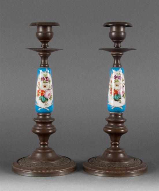 Appraisal: Pair of French patinated metal and porcelain candlesticks second half-