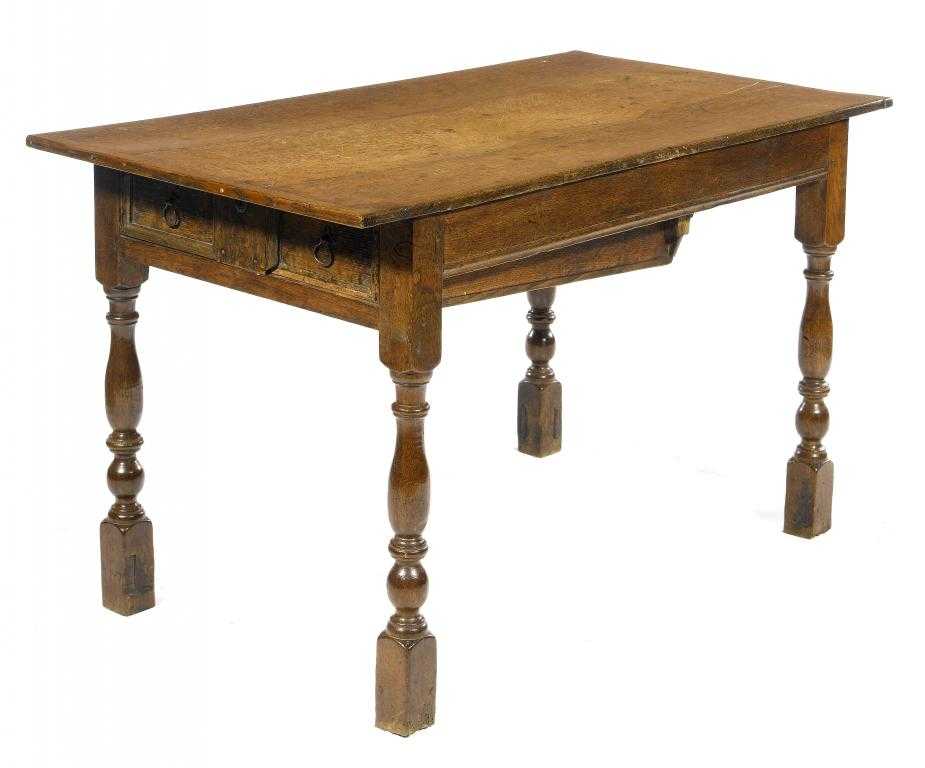 Appraisal: AN OAK TABLE the three plank top with cleated ends