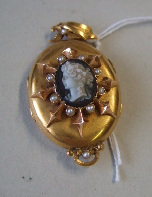 Appraisal: A Victorian gold banded agate and half pearl set oval